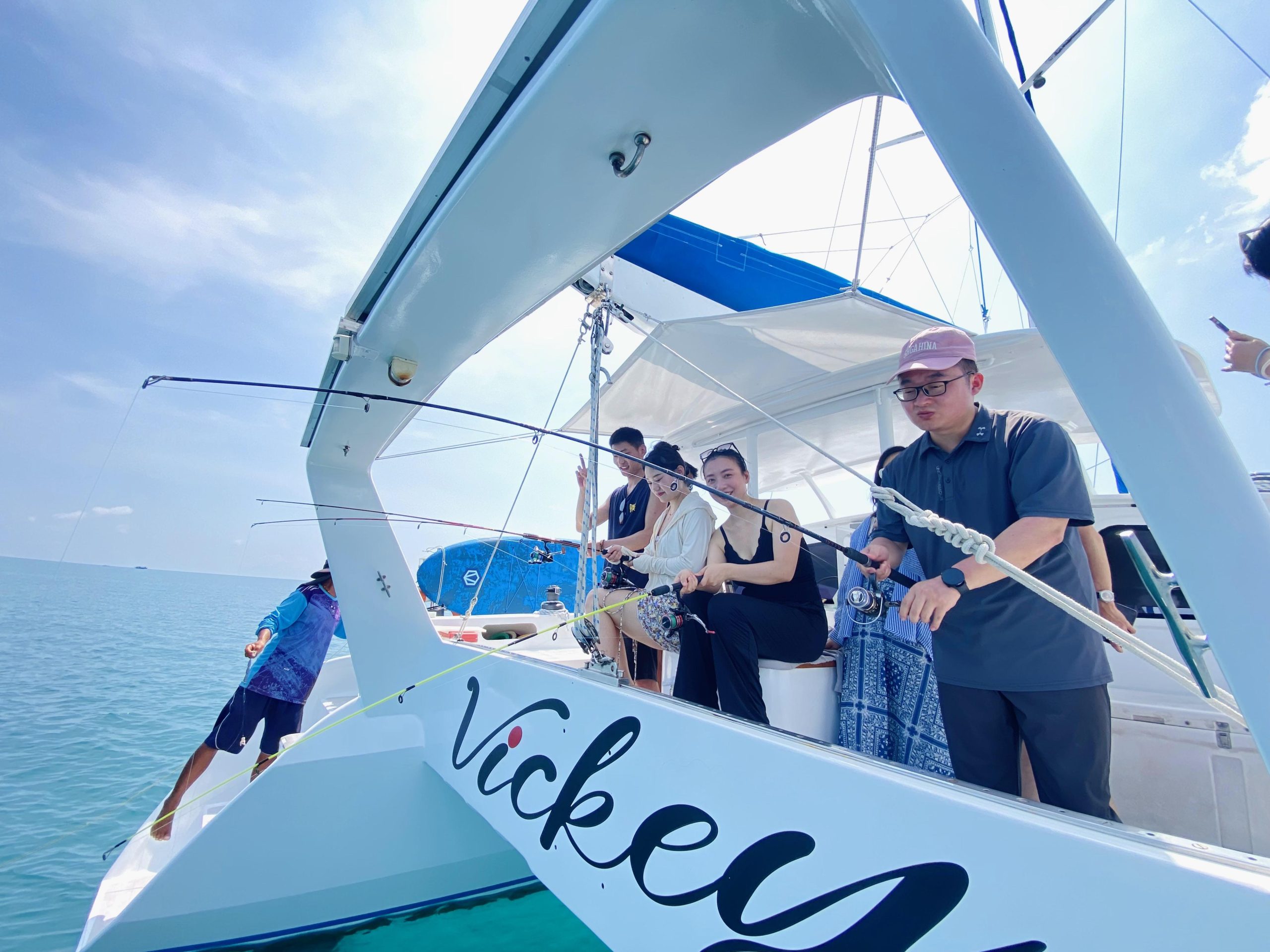 Guests fishing on Vickey Catamaran – Koh Samui Private Charter